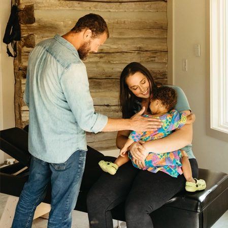 Chiropractor Clarksville TN Dale Brown With Mom And Baby